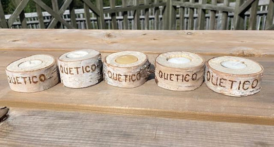 Set of 5 Candles in a Wooden Log Piece that has Quetico on it